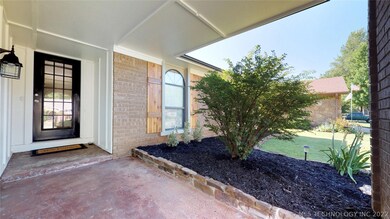 Inviting entry with new shutters and fresh landsca