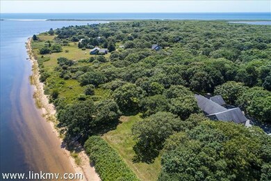 This lovely Chilmark property has pond frontage on Tisbury Great Pond as well as views of and access to the Atlantic.