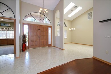 The entrance boasts light filled windows and skyli