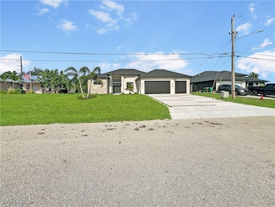 View of front of home with a front lawn, concrete
