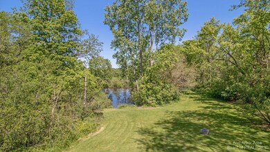 Rear yard and pond.