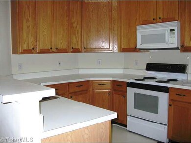 Kitchen. The kitchen is bright and open.