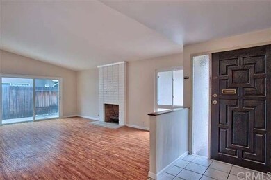 Vaulted ceilings and fireplace in living room