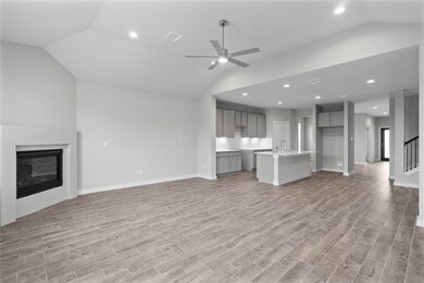 A beautiful view from the family room into kitchen.