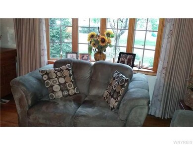 Living Room. Beautiful bay window lets in lots of 