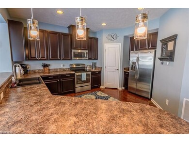 ANOTHEER VIEW OF THE LARGE KITCHEN WITH ELEGANT PE