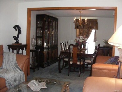 View from living room to formal dining room. Natur