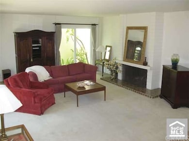 Living room with fireplace.