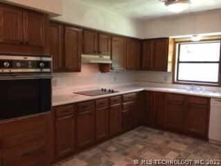 Roomy kitchen with ample storage.