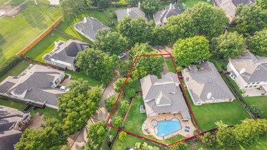 This street is tree lined and so very quiet.. This home has so much space even with the giant pool in the backyard! Located just behind the community fence on the left is Woodcreek Junior High. AND just down the street from there is Woodcreek Elementary!