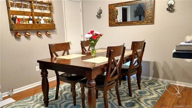 Enjoy this large dining area! Pull up some stools 
