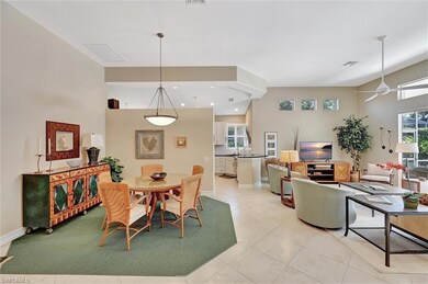 Dining room featuring light tile patterned floors,