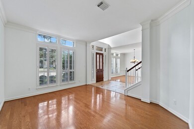 Formal Living room with natural light and 
 front landscape views