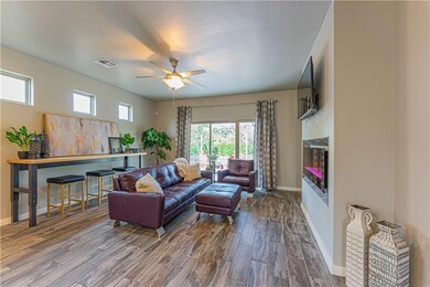 Living Room with Linear Fireplace (on a remote)