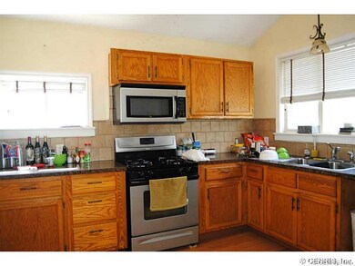 Kitchen. Owners in process of moving.  New picture
