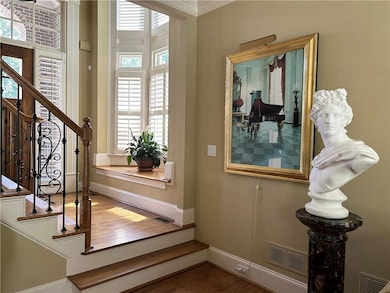 Doorway to outside featuring wood finished floors,
