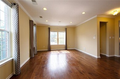 LARGE LIVING ROOM WITH HARDWOOD FLOORING