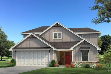 Craftsman inspired home with a garage and a front 