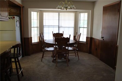 Nice dining area with beautiful bay window.