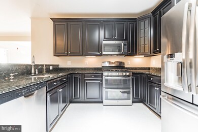 41895 Cathedral Valley Square unit 404, Aldie, VA 20105 - photo 6