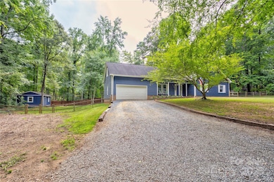 Plenty of parking. Circle drive that leads into the main driveway. Still room for your boat, 4 wheelers, hobbies. No HOA! Note: Storage shed also.