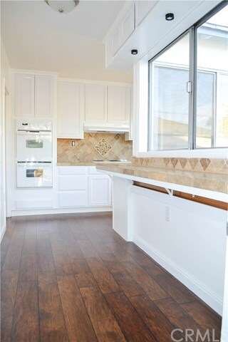 To the right here is a sunny breakfast bar ready f