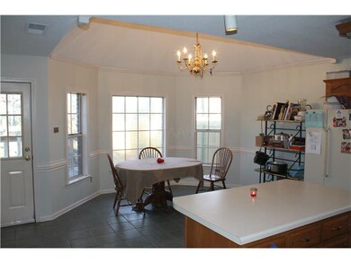 another view of the kitchen with the breakfast are