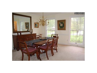 The formal dining room with chair rail and crown m