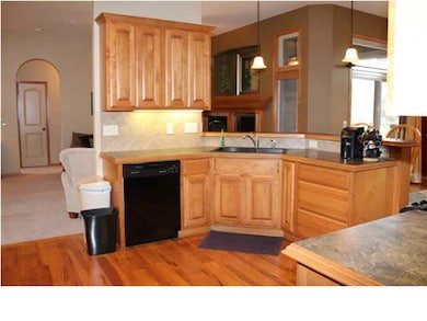 Gorgeous Hickory floors and a durable granite sink