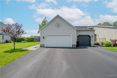 Exterior features include updated landscaping, har