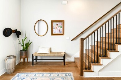 Staircase featuring baseboards and wood finished 