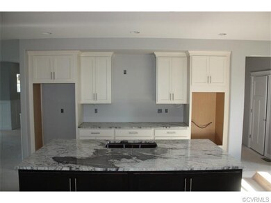 Custom Cabinetry with 5 x 8 Granite Island / Bar T