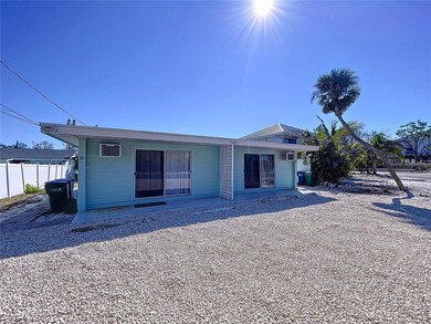 Prime Holmes Beach location with the beach access just 2 doors away.  Beach access shown with red arrow.