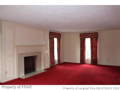 Living room has fireplace 1