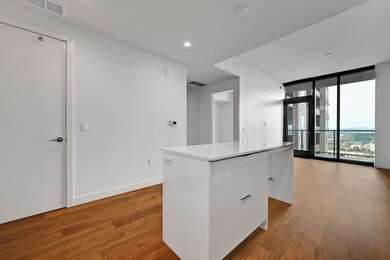 Kitchen featuring light wood finished floors, vis