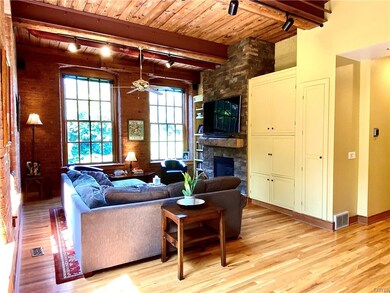 Custom built-ins surround the gorgeous gas, stone 