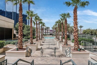 Surrounding community featuring a pool and a patio