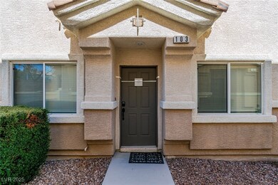 Entrance to property with stucco siding