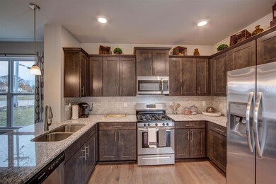 Stainless Steel Appliances!! Photo of decorated model home.