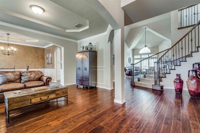 Living room with dark hardwood / wood-style floori