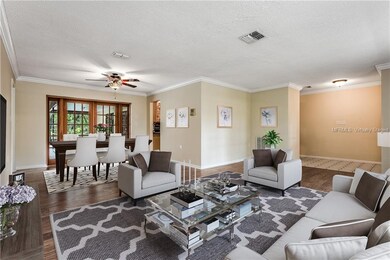 Living and Dining room virtually staged with furni