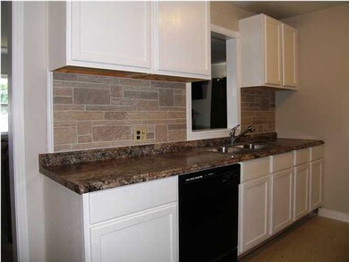The south wall of the kitchen with the overlook in