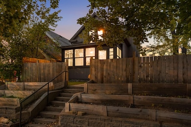 Inviting entry with raised plant boxes