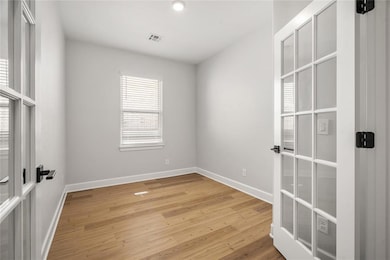 Private study with French doors—ideal for a home office or creative space.