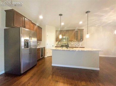 6490 Tranters Creek Way, Colorado Springs, CO 80925 - photo 6