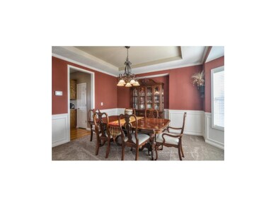 Nice size formal Dining with built in niche for Bu