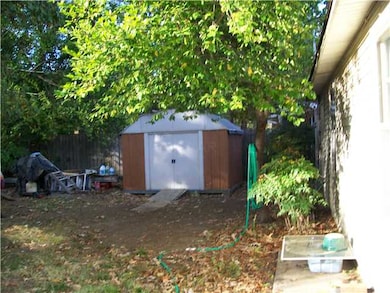 The second storage building appx 10 x 12.  Fenced 