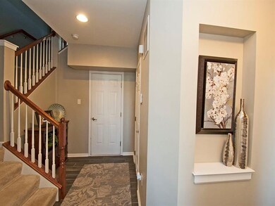 Main level storage area, laundry room and access t
