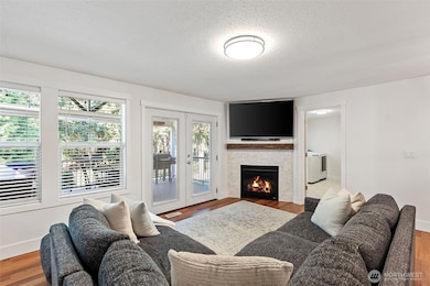 Main level family room with gas fireplace.