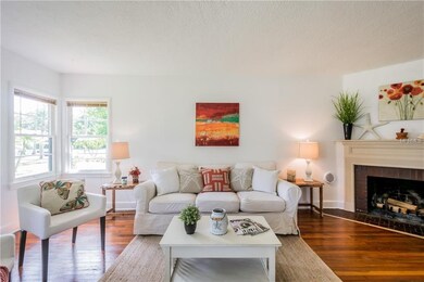 Bright spacious living room with corner windows on